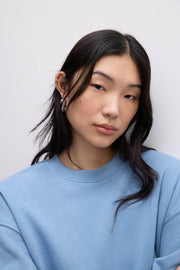 Zoomed view of a light blue women's sweatshirt